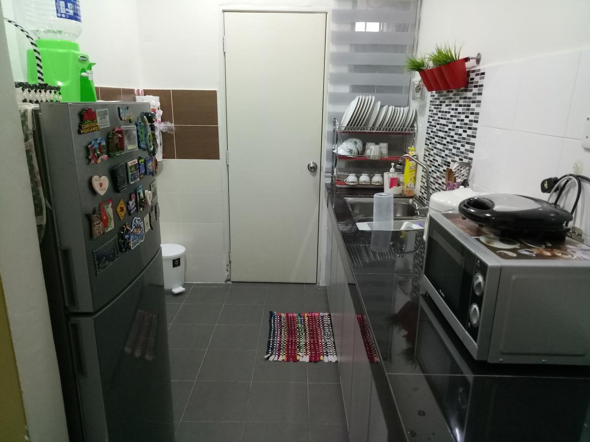 Miker Homestay Сери Искандар Екстериор снимка