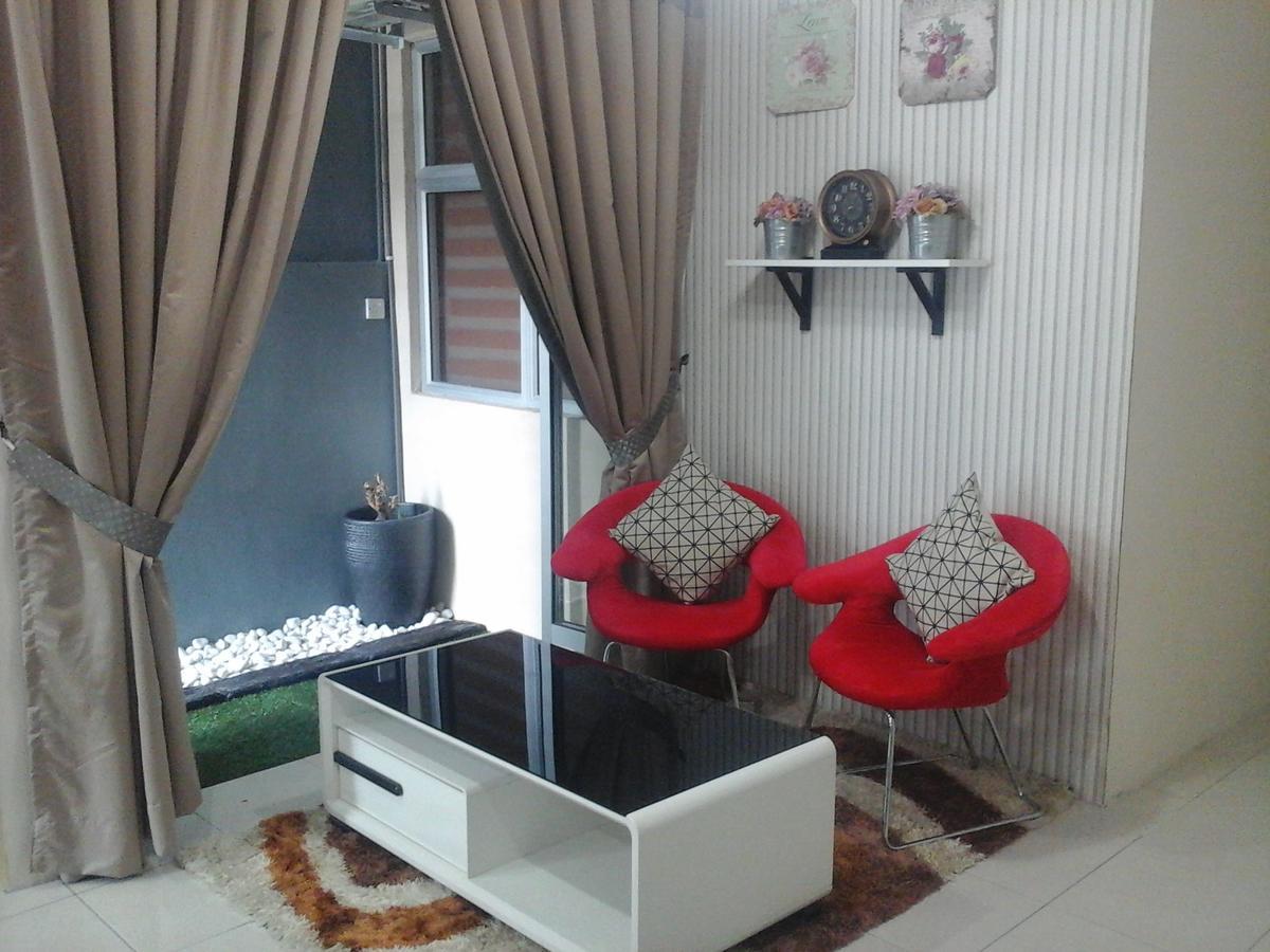 Miker Homestay Сери Искандар Екстериор снимка